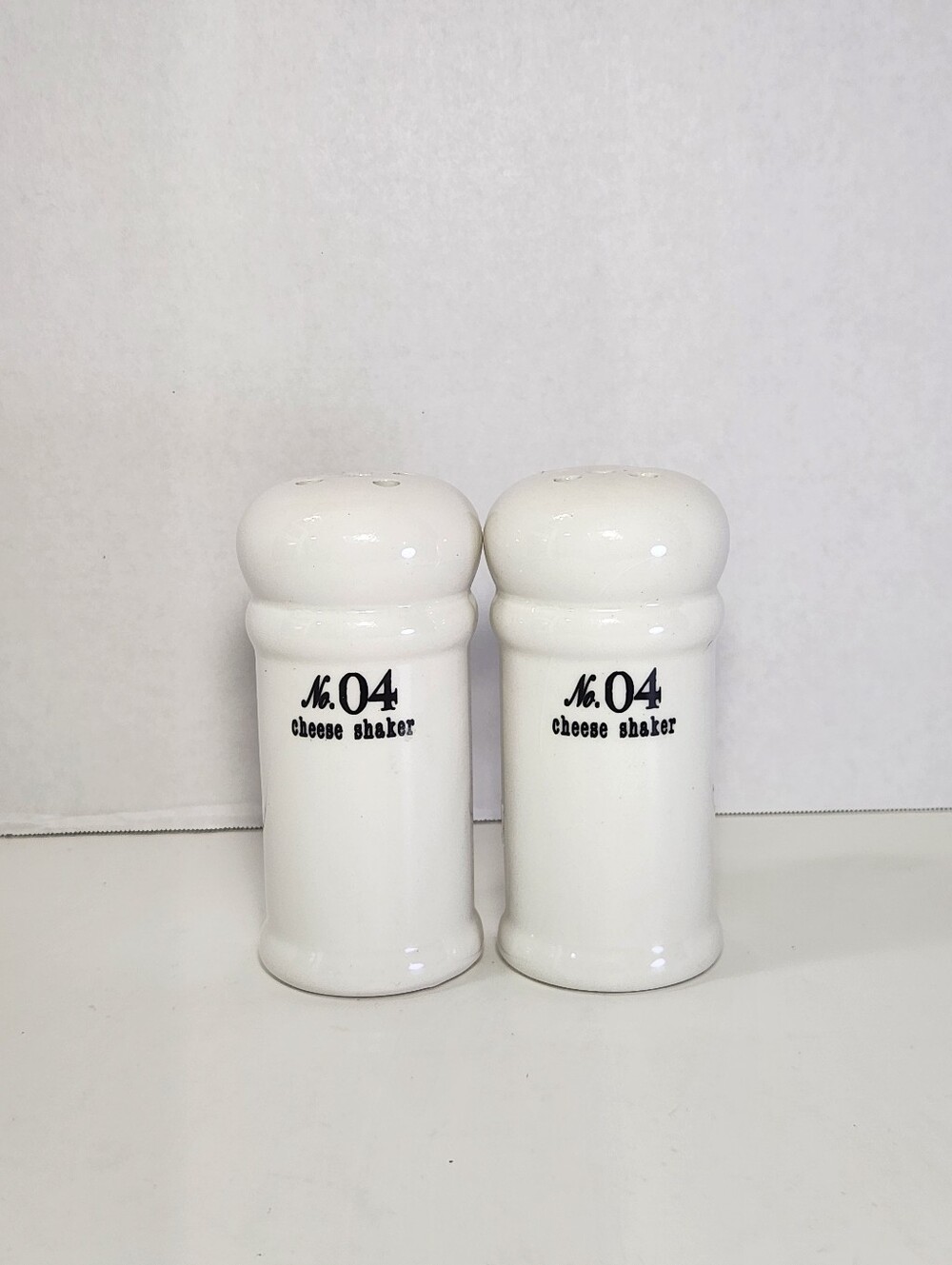 White Ceramic No. 04 Cheese Shakers Set of 2, Perforated Tops With Stoppers